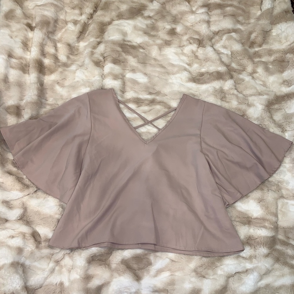 Flowy blouse with criss cross back detail